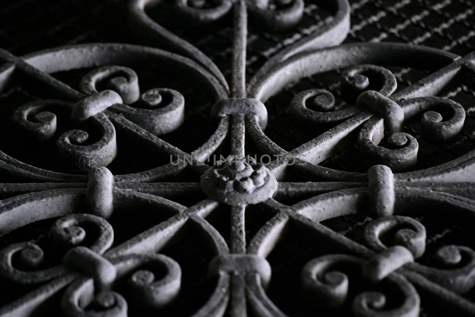 An abstract background image of decorative wrought iron with short depth of field.
