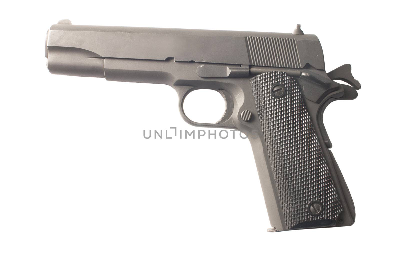 Semi -Automatic pistol cocked and ready to fire isolated on a white background