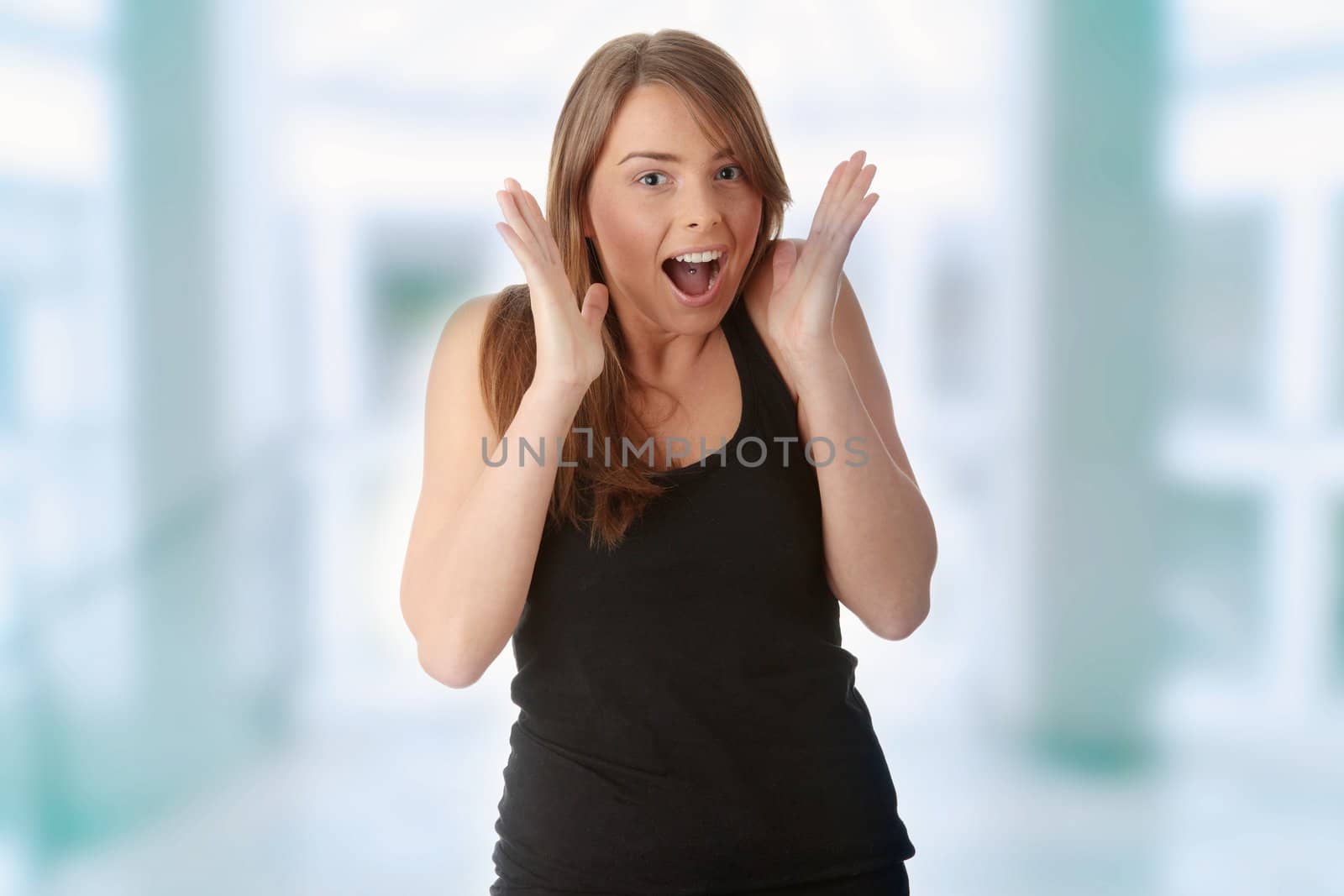 Shocked young beautiful woman by BDS