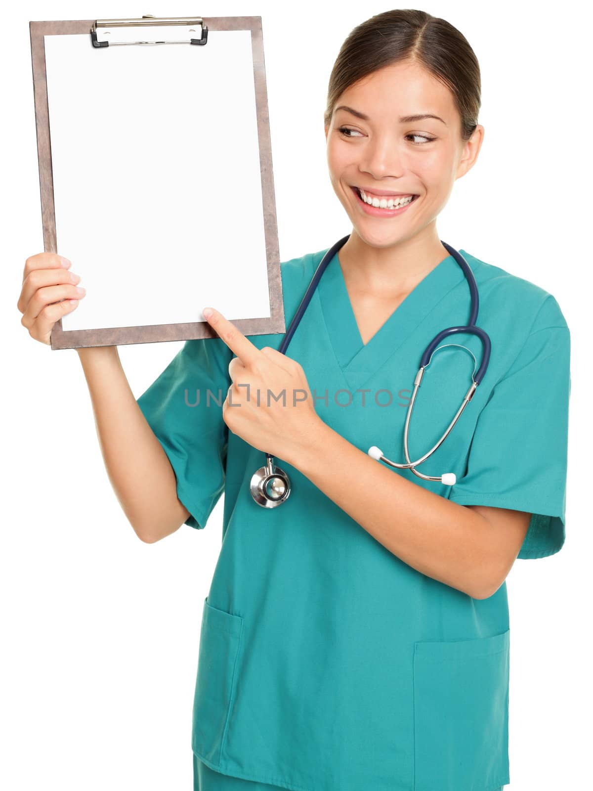 Nurse showing clipboard sign with blank paper for copy space. Ethnic Chinese Asian / Caucasian female nurse or young doctor wearing scrubs and stethoscope isolated on white background.