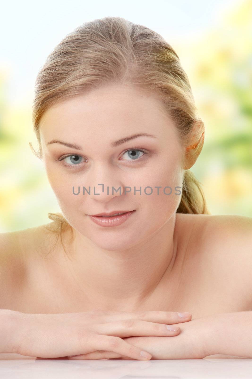 Close-up, portrait of a beautiful woman getting ready for the spa treatment