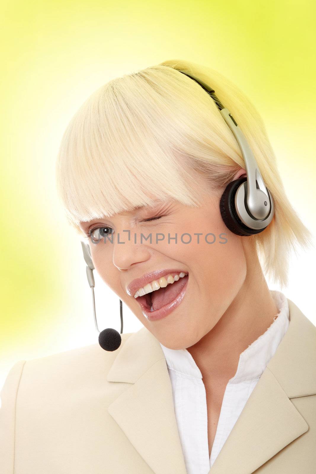 Call center woman with headset. Over abstract green background