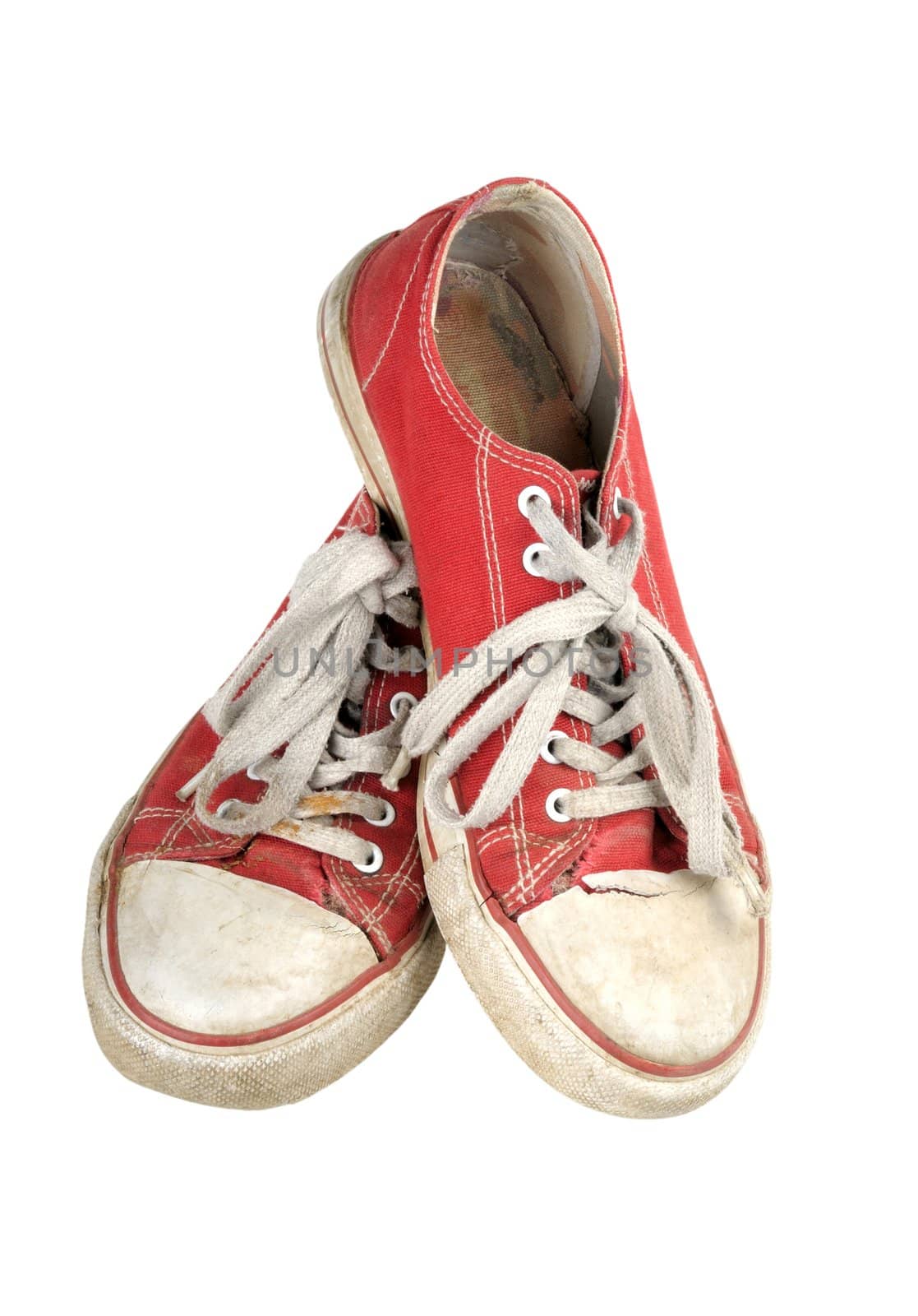 old red sneakers isolated on white background
