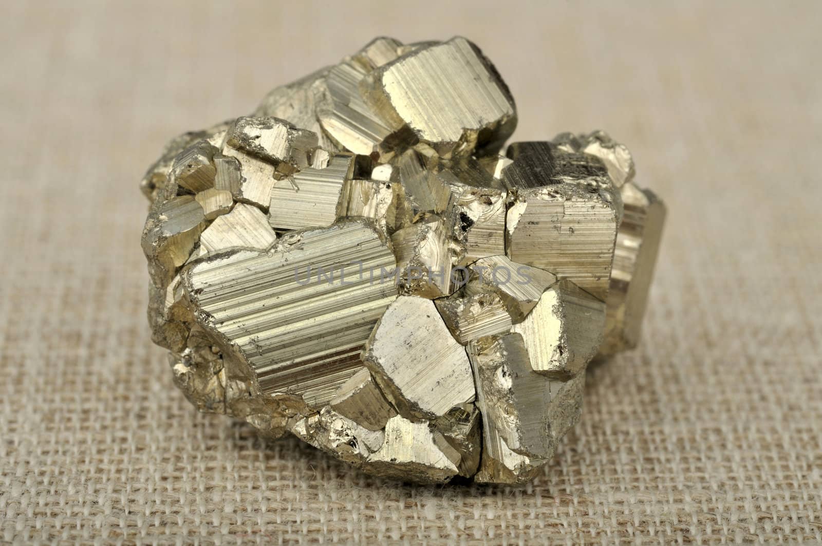 pyrite in the background of a burlap