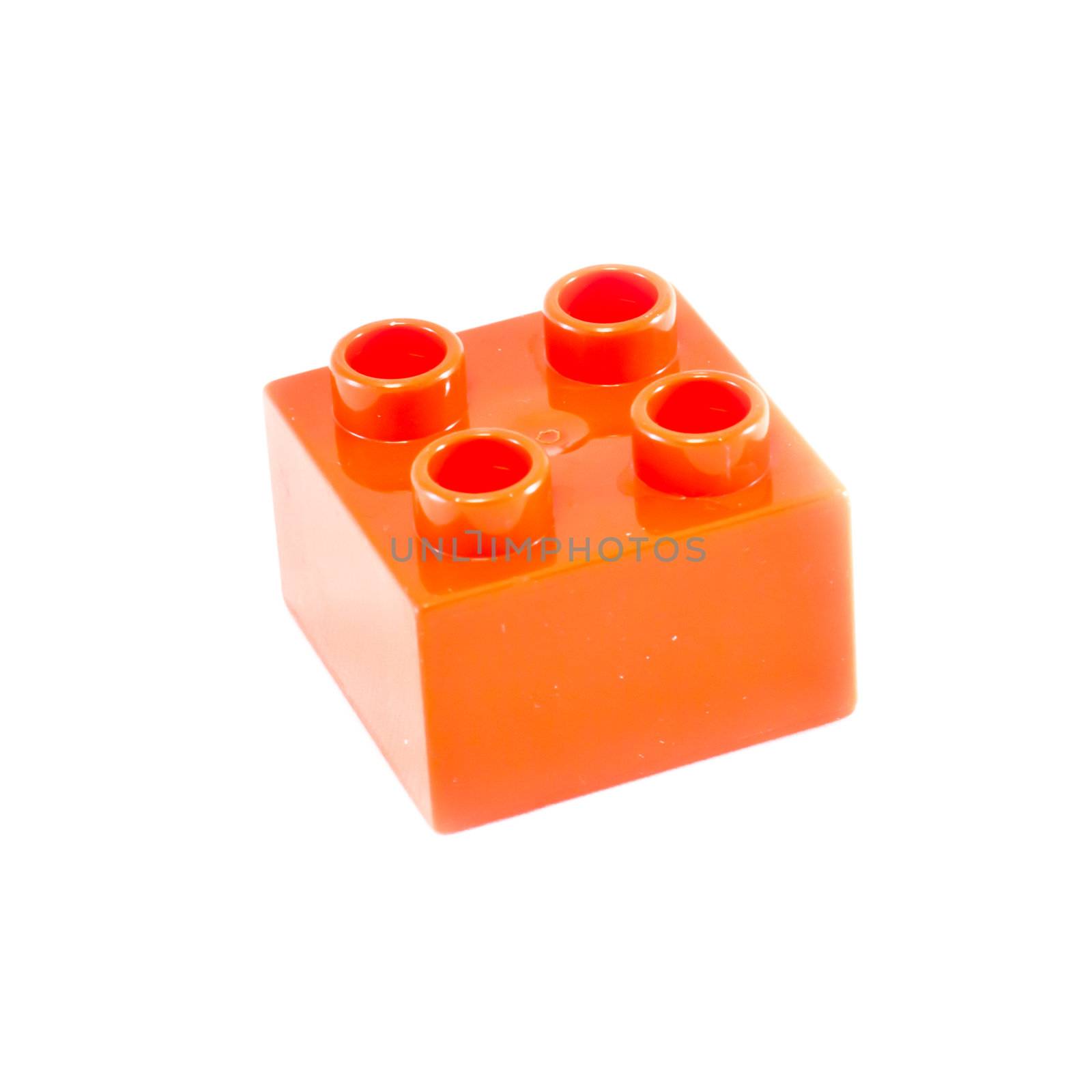 Plastic building blocks on white background. Bright colors.