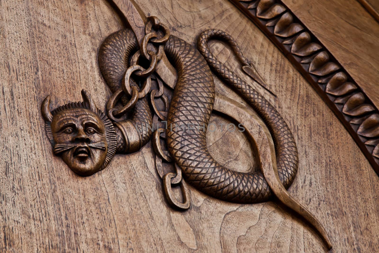 Medieval demon on antique door- Sacra di San Michele (St. Michael Abbey) - Torino - Italy