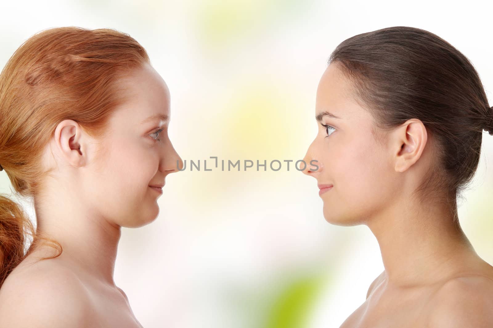Spa - portrait of two woman - redhead and brunette