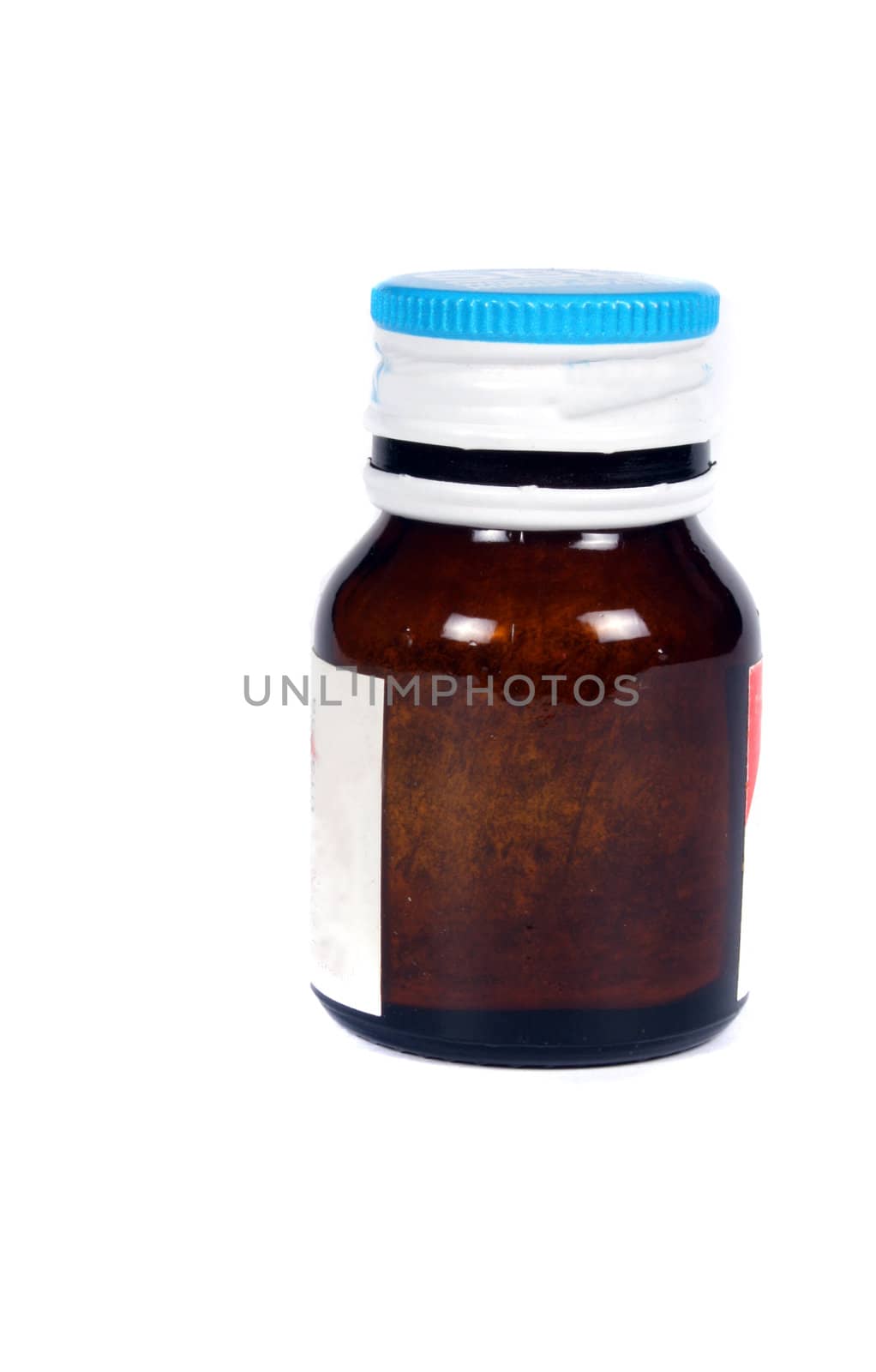 A medicine bottle, on white studio background.