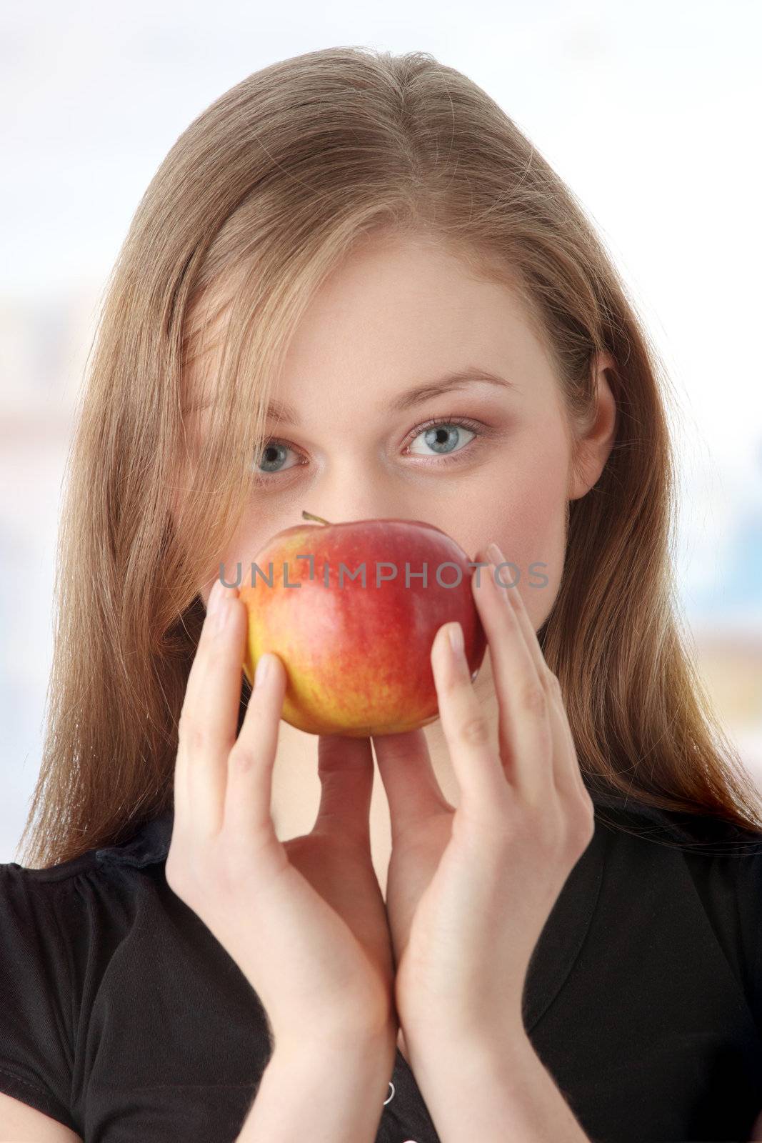 Young woman with apple by BDS