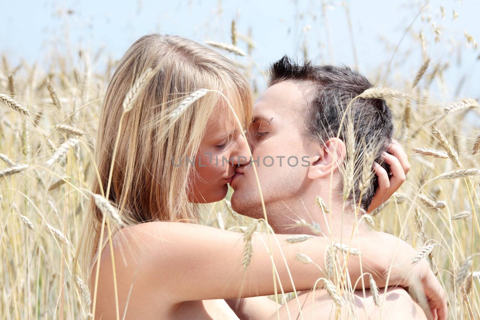 A beautiful couple in wheat field by BDS