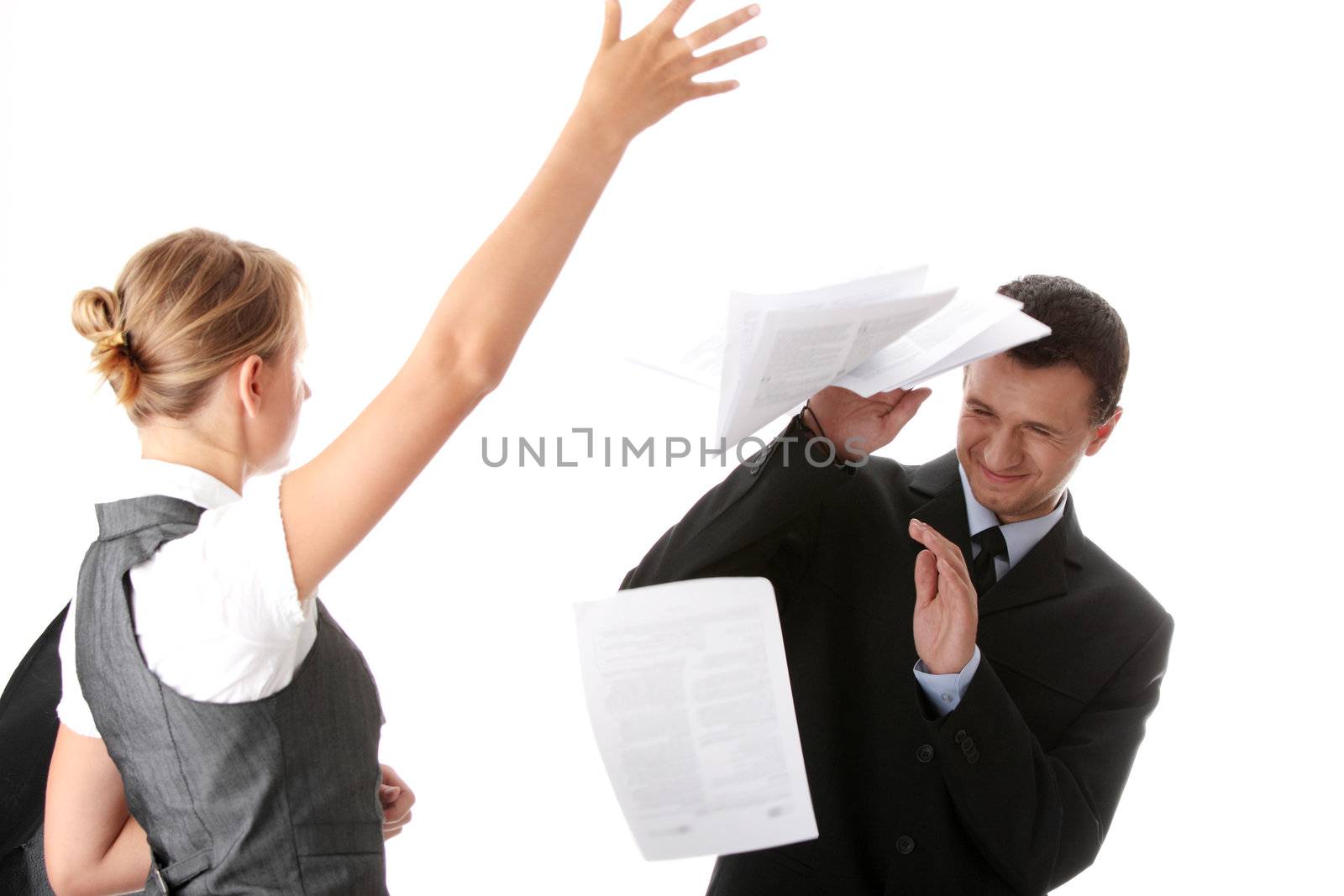 Woman throwing papers on man - office argue concept
