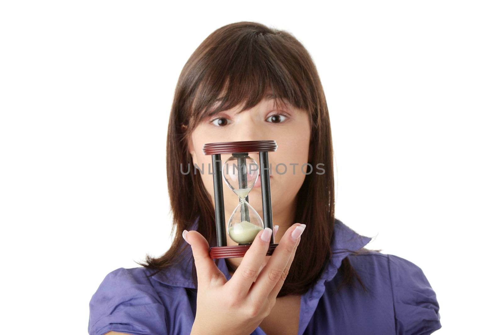 Young business woman with hourglass - time concept
