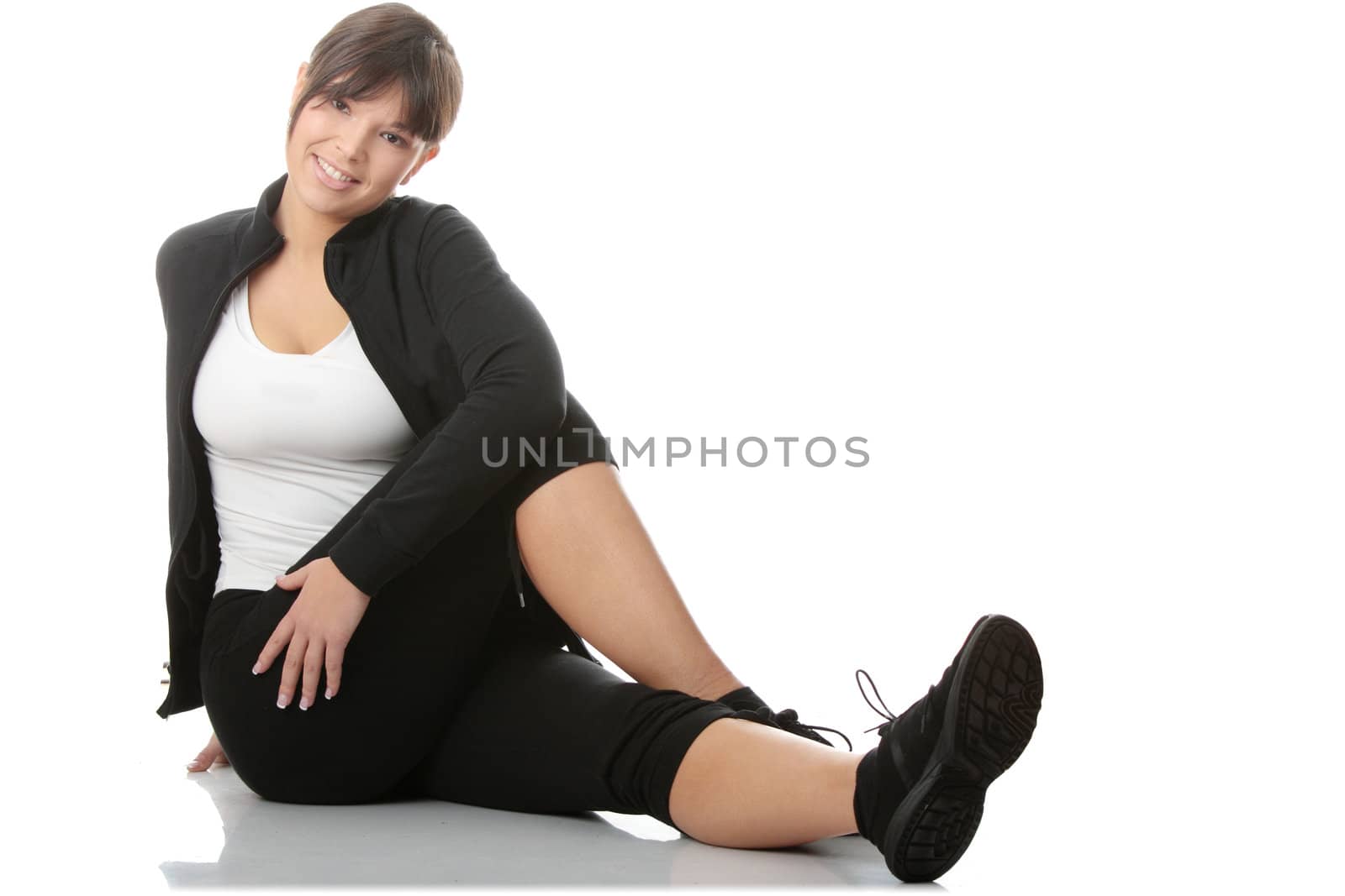 Beautiful young woman doing exercise , isolated