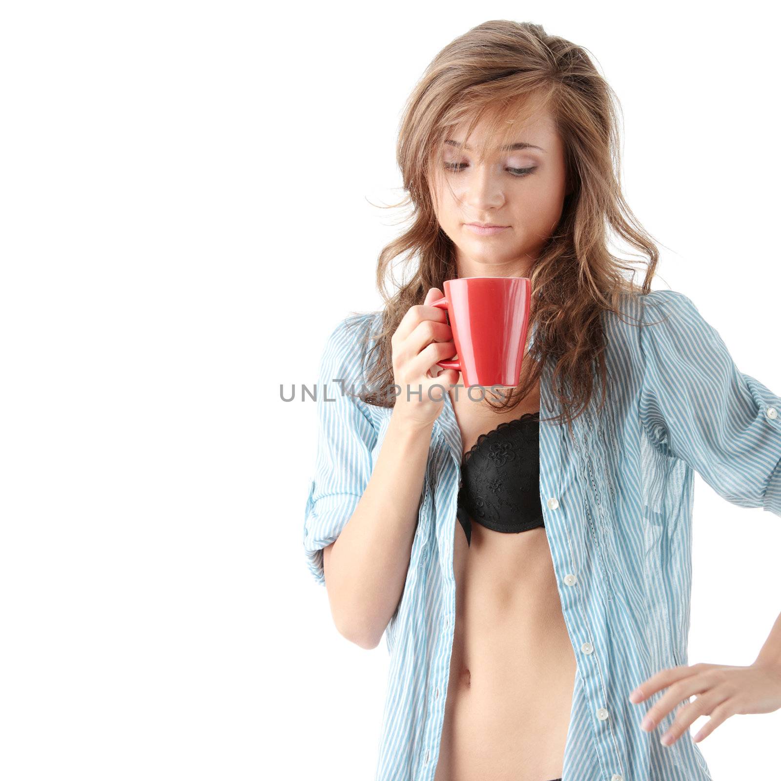 Woman drinks morning coffee or tea by BDS