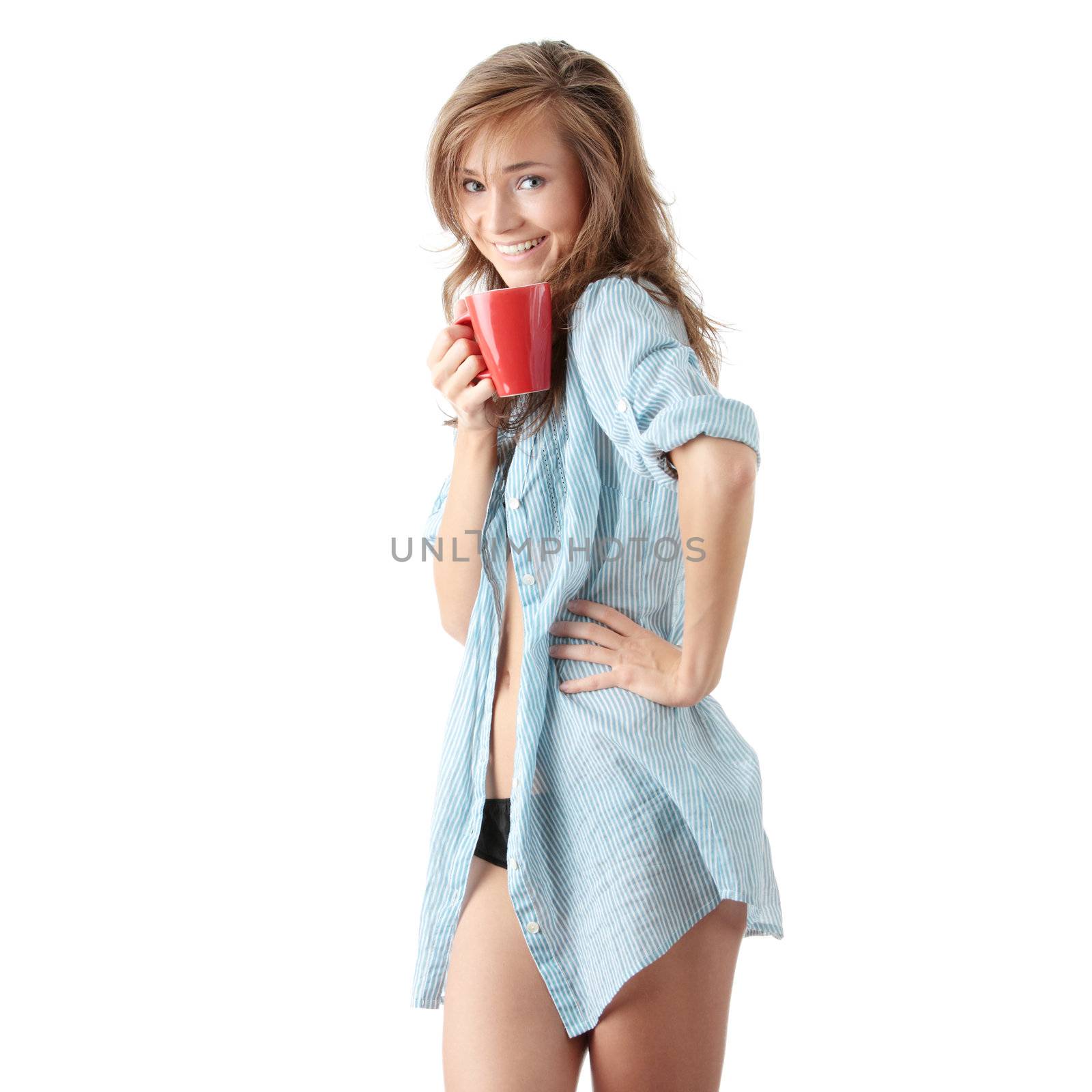 Woman drinks morning coffee or tea by BDS