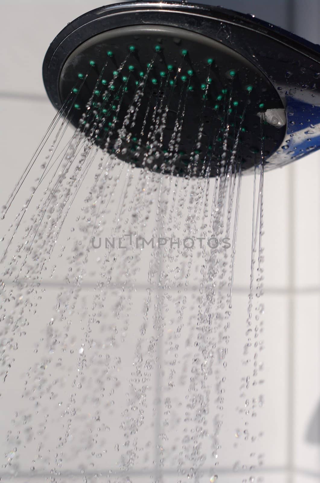 water drops falling from a shower indoors