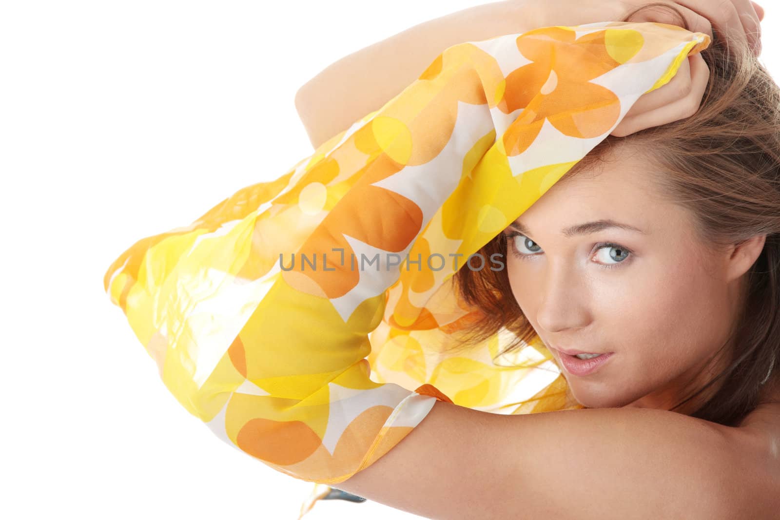 Young beautiful slim woman posing in bikini - with wind, isolated