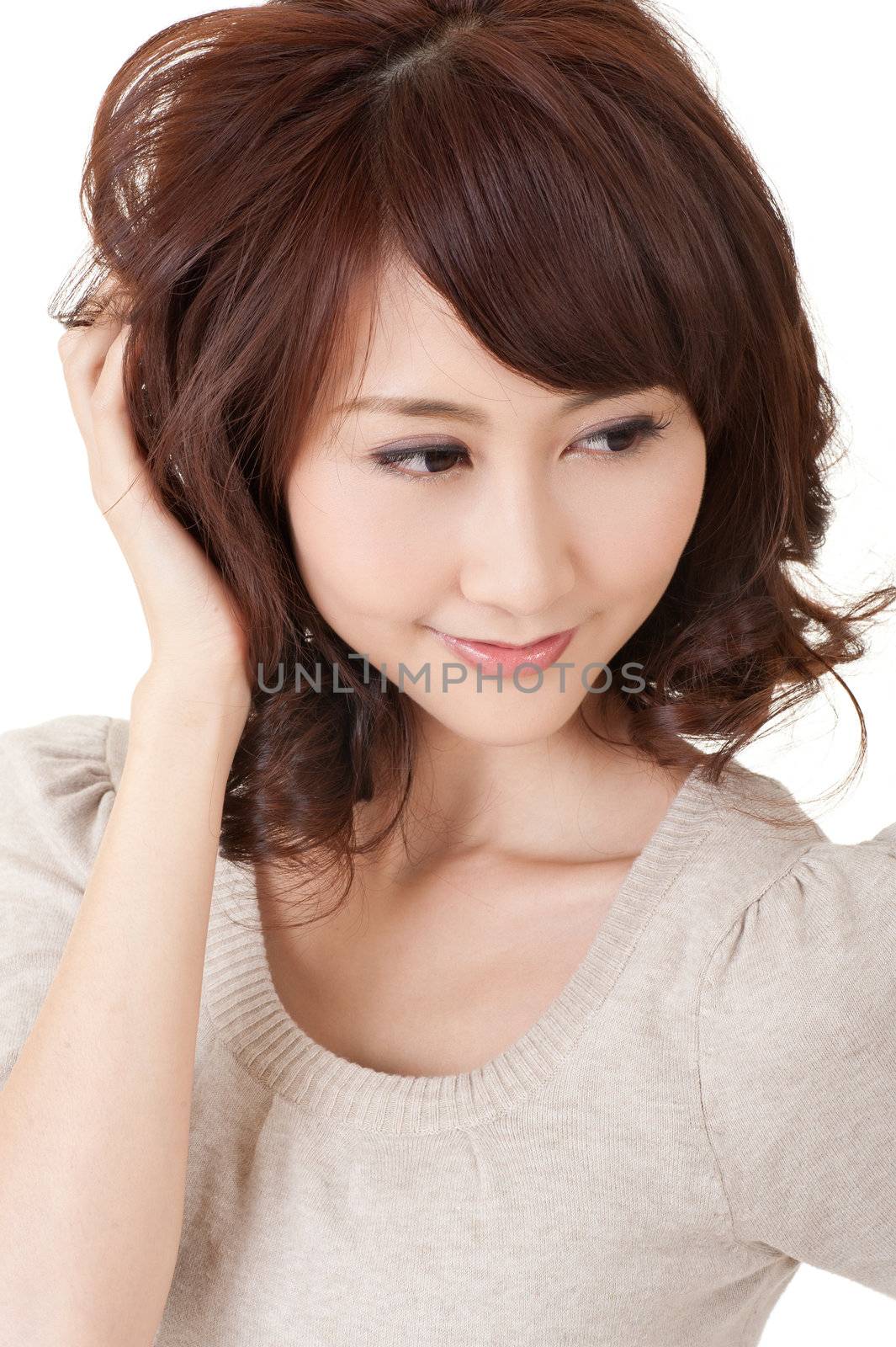 Attractive Asian beauty looking, closeup portrait on white background.