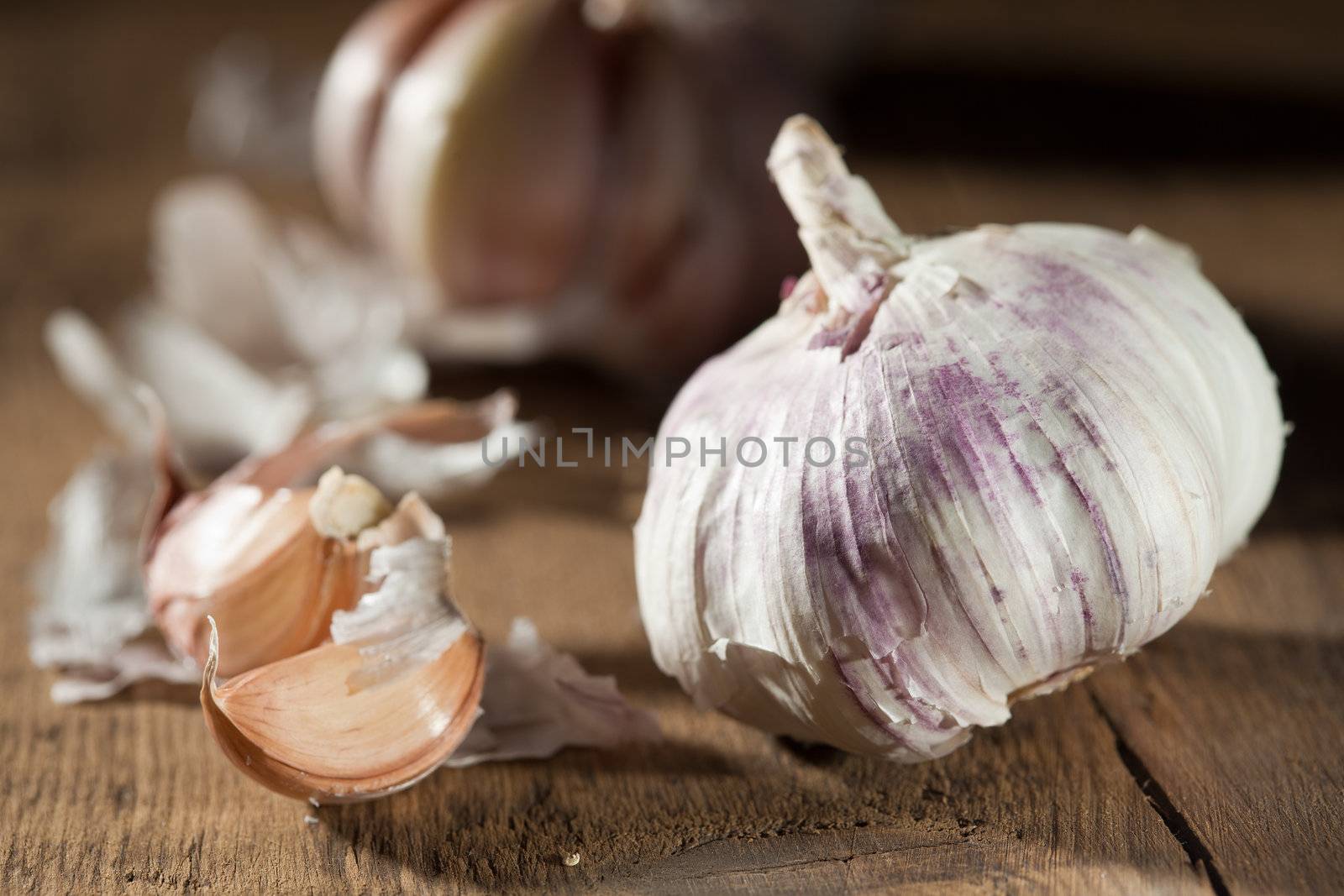Closeup of garlic on wooden background