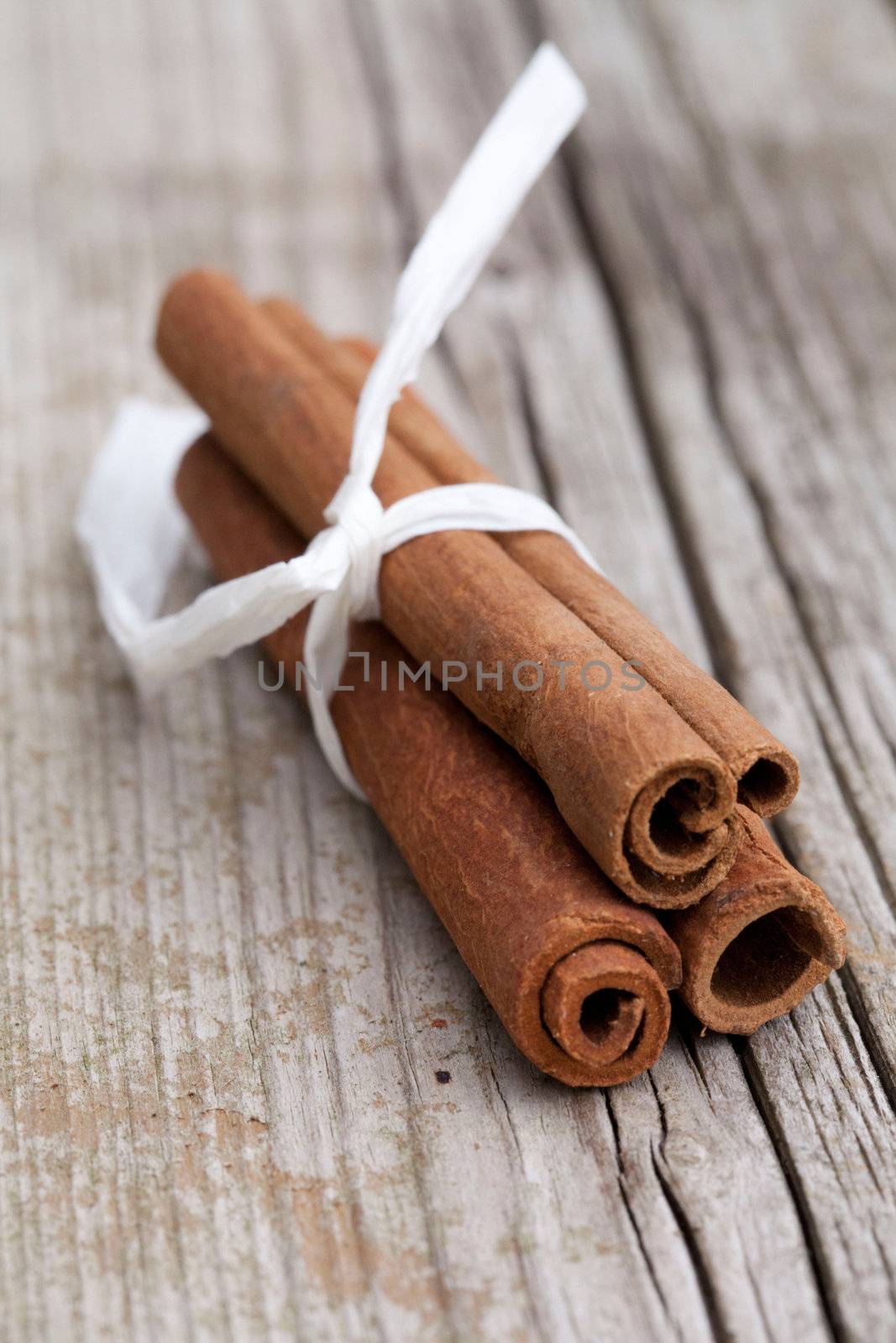 Cinnamon spice Sticks on wooden board