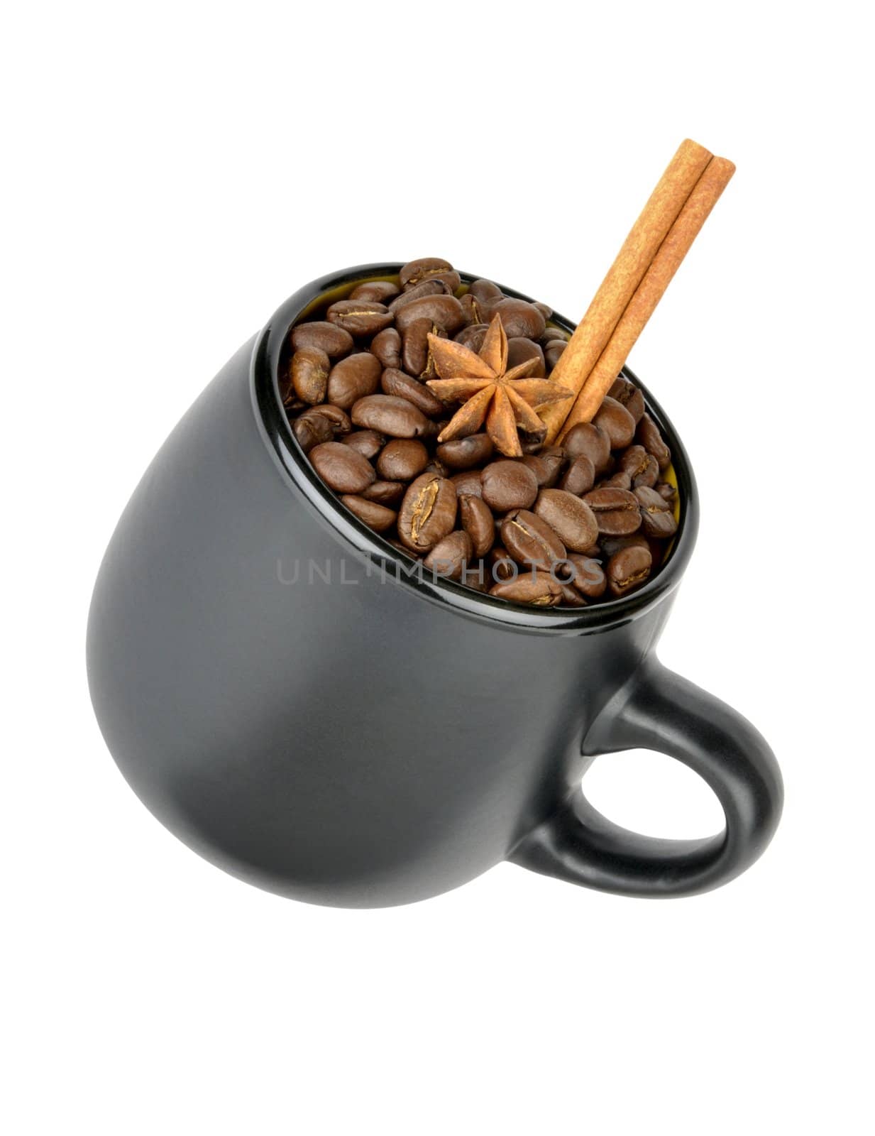 coffee beans and spices in a mug