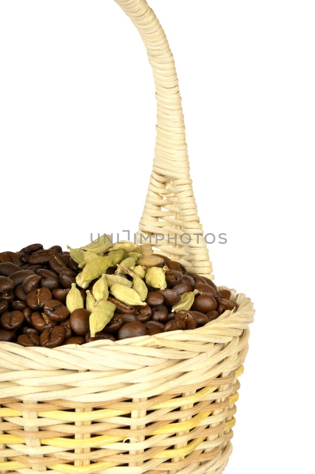 Coffee and cardamom in a basket ,isolated on a white