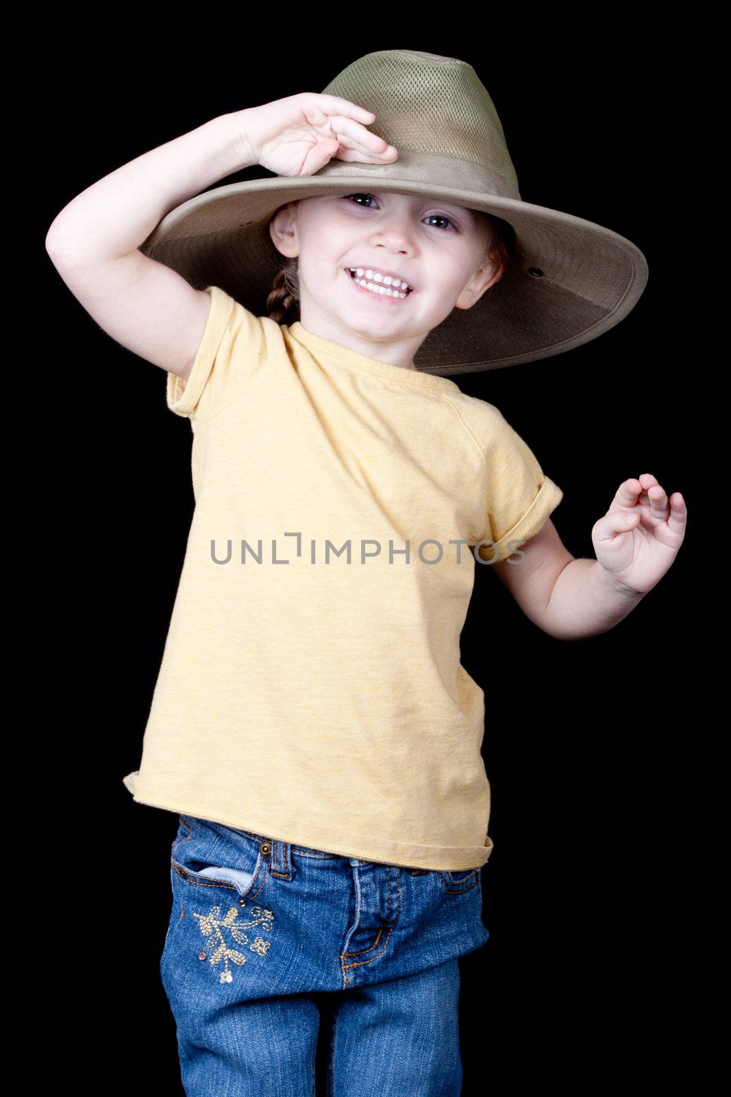 A girl is saluting with her oversized hat.  She is saying Aye Mate!