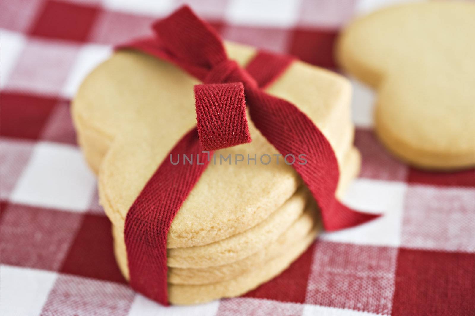 Heart shaped cookies with a red ribbon