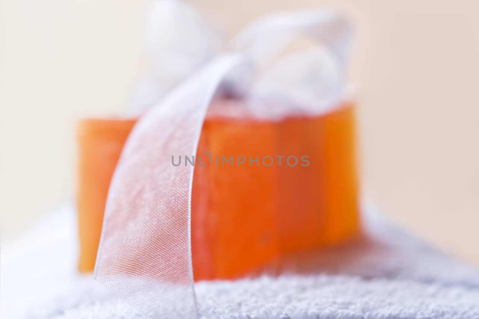 Handmade soap and towel in a spa - very shallow depth of field