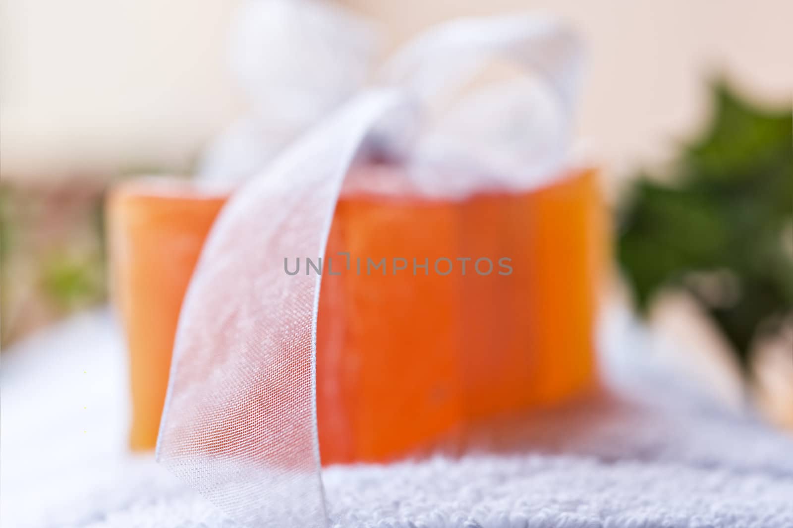 Handmade soap and towel in a spa - very shallow depth of field