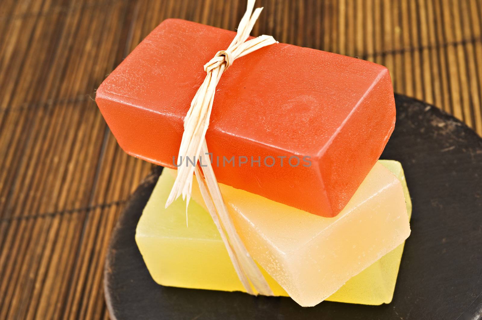 Three bars of organic glycerin soap in a spa.