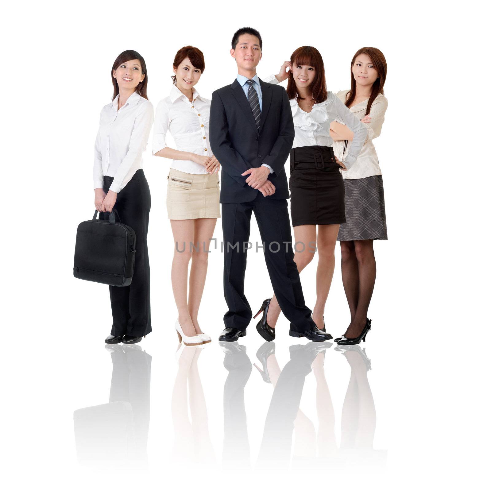 Asian business team, businesswoman and businessman in group standing and looking at you, isolated on white background.