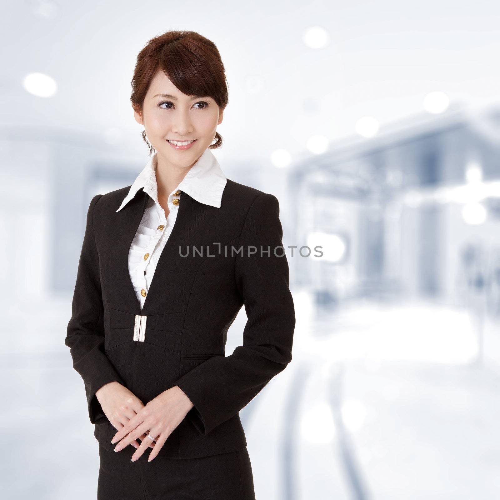 Successful young executive woman by elwynn