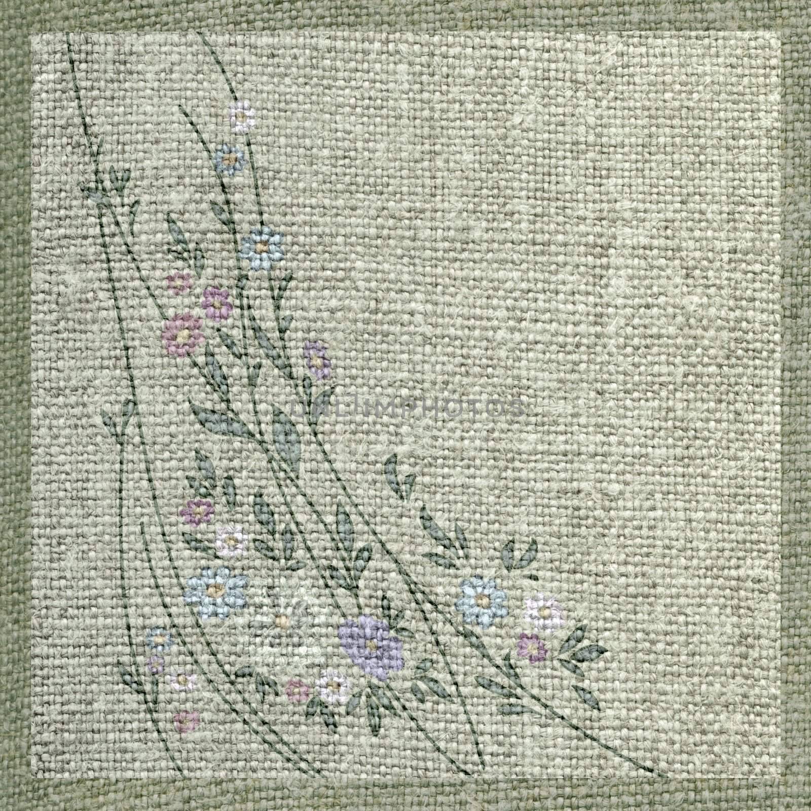 Artistic background, abstract flowers and leaves on a linen canvas