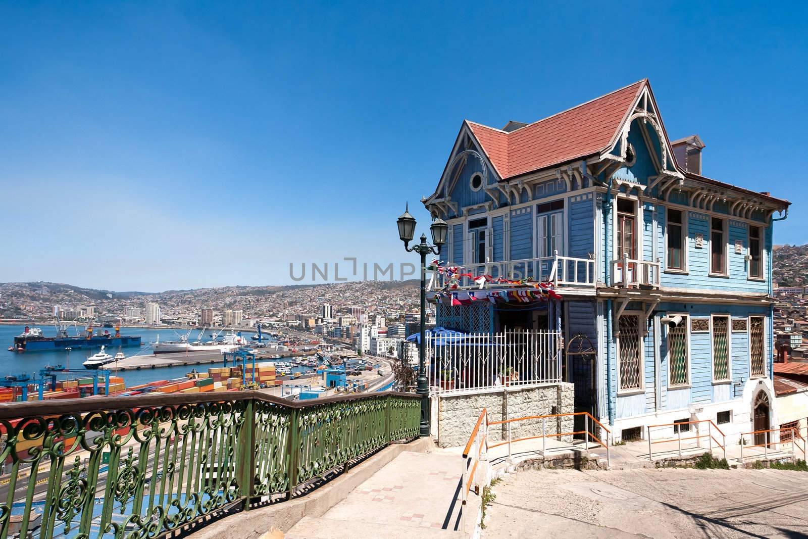 Colorful house in Valparaiso, Chile with view on yhe port. UNESCO World Heritage.