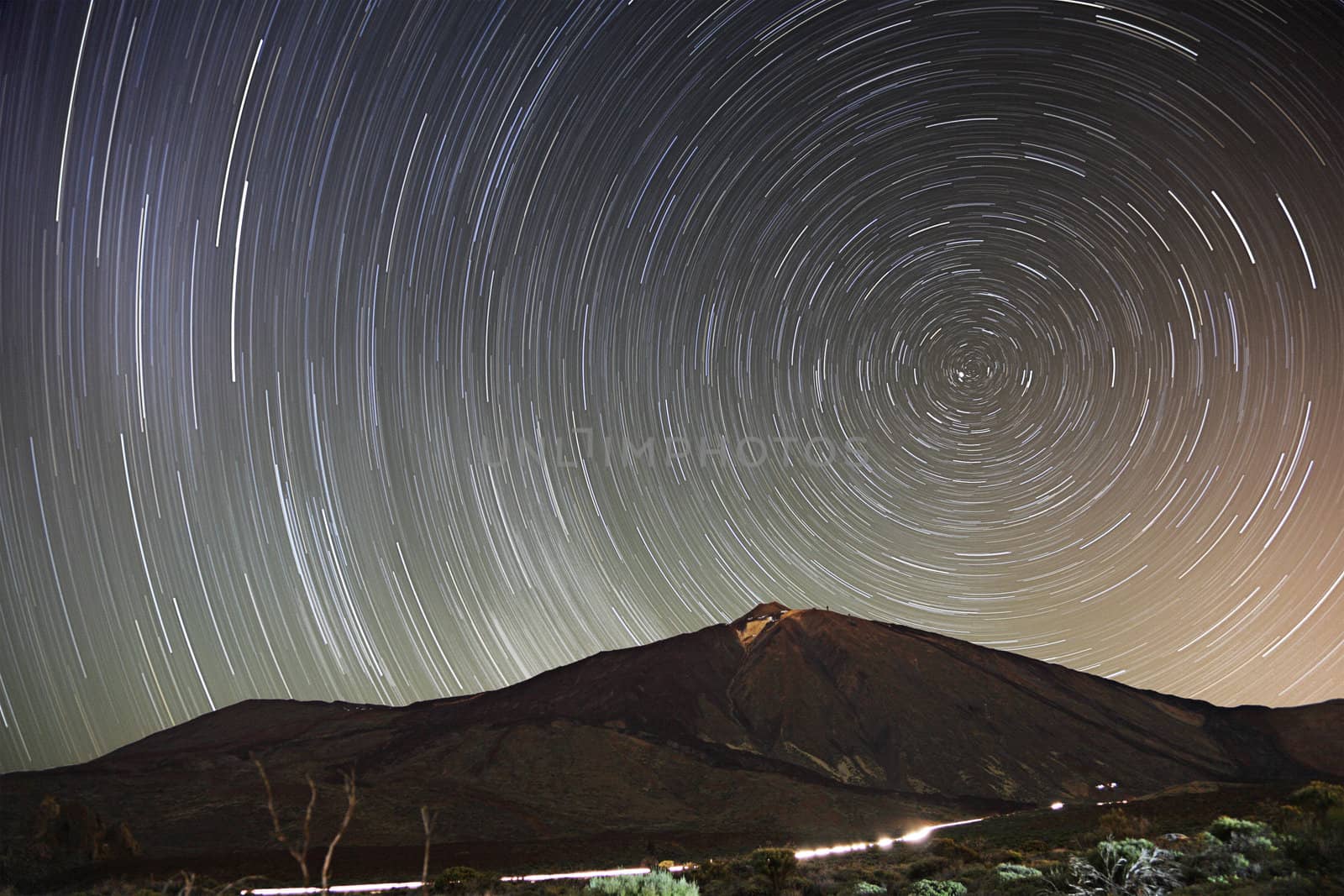 Stars. Star trail night sky on Teide, Tenerife. 65 min long exposure of a remarkable star clear night sky with Teide in the scene. Early Spring.
