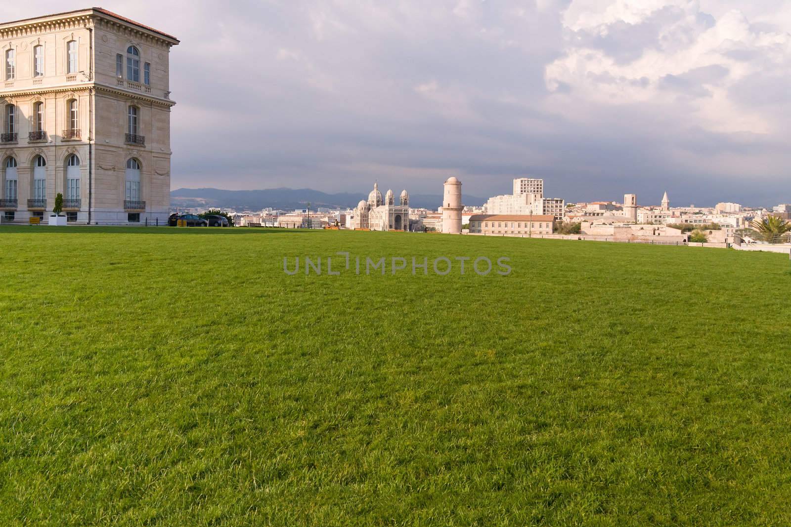 Medieval Fortress and cathedral front lawn in Marseille France