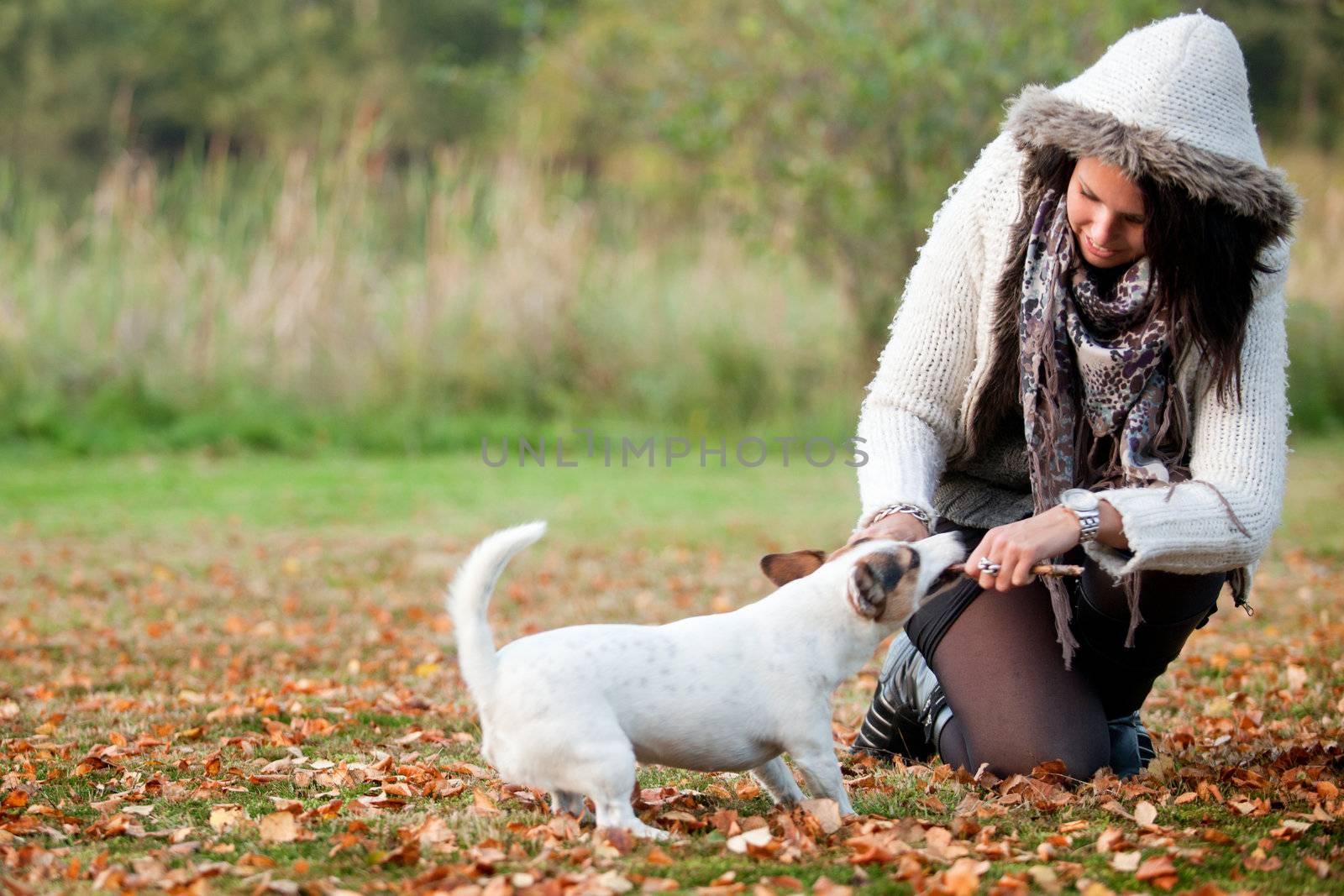 Happy girl with her Jack Russell Terrier