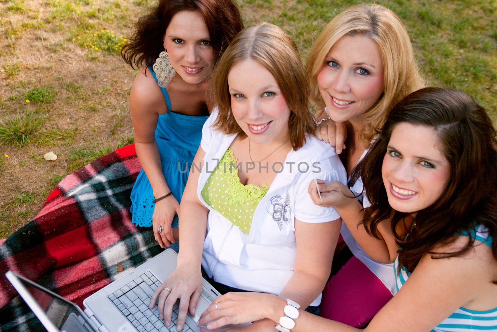 Girlfriends are having fun in the park