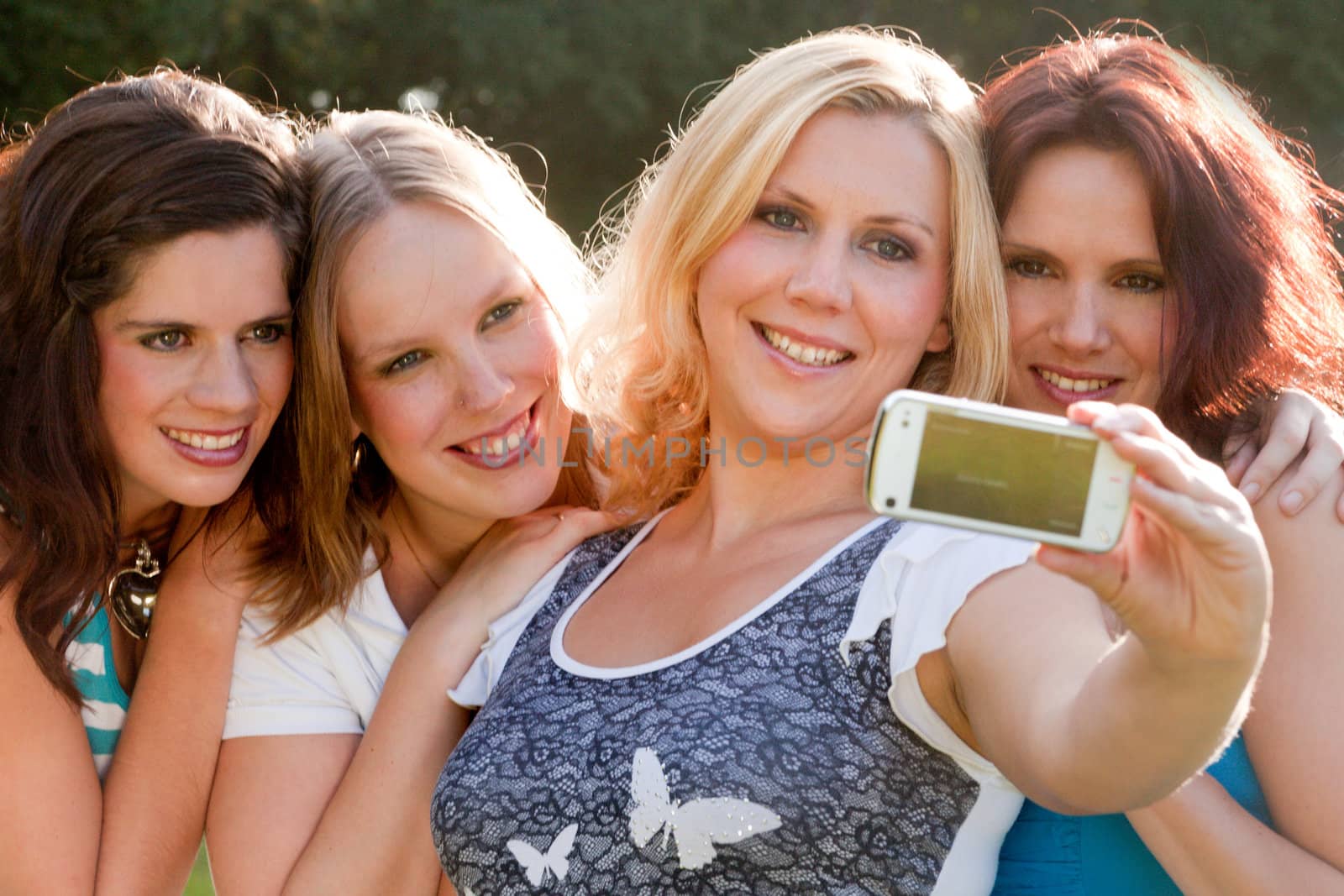 Girlfriends are having fun in the park