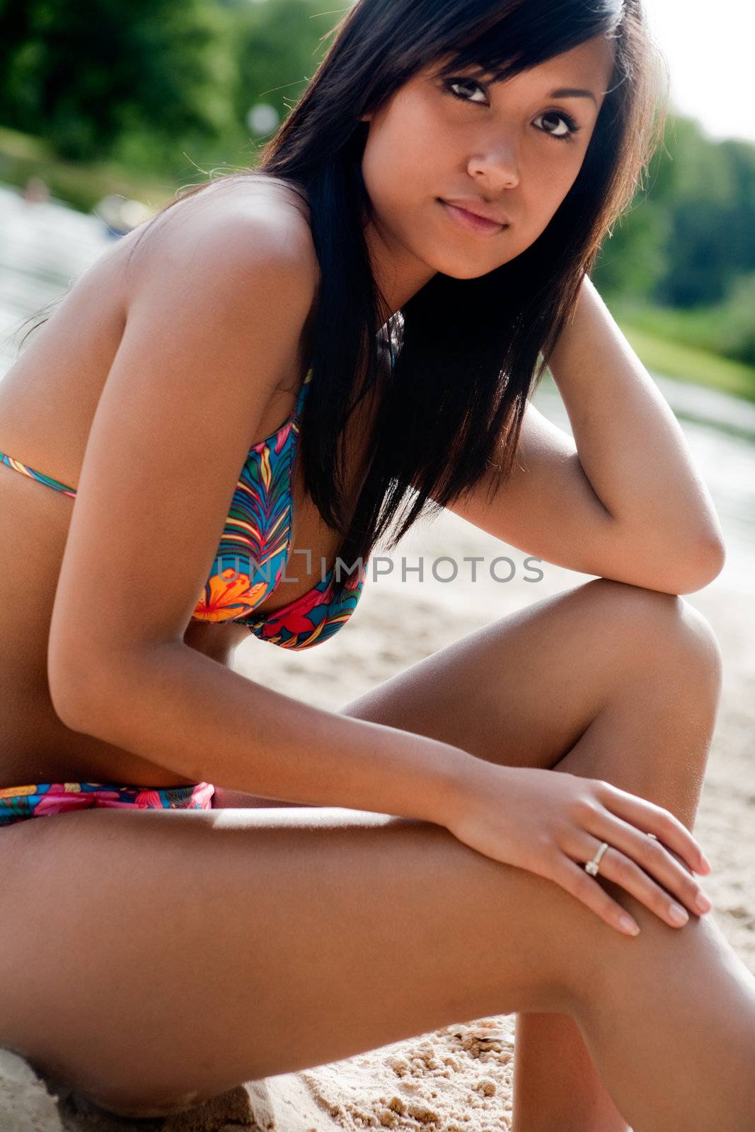 Young happy asian woman looking beautifull in her bikini