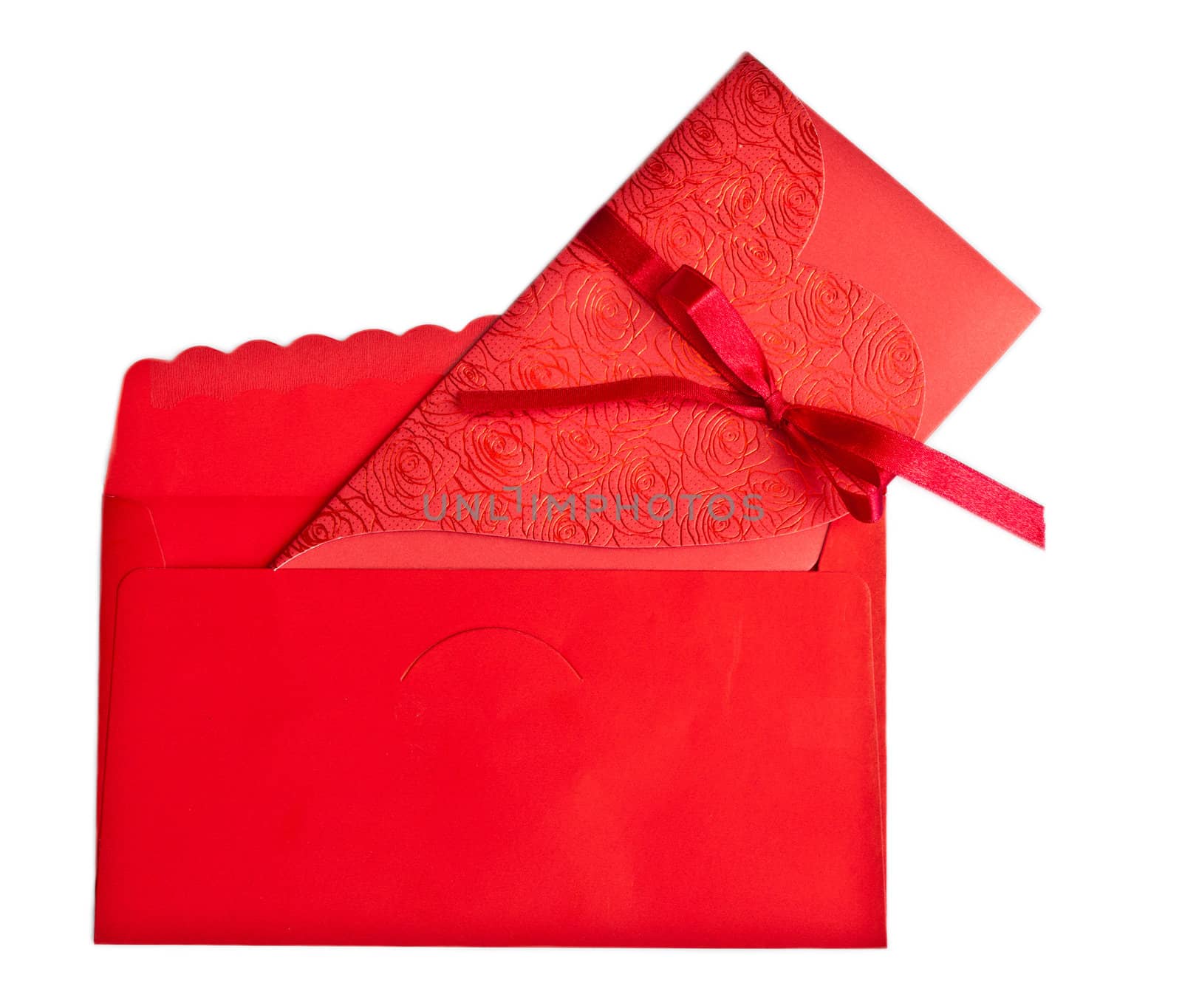 Red marriage invited and envelope with tied red ribbon.