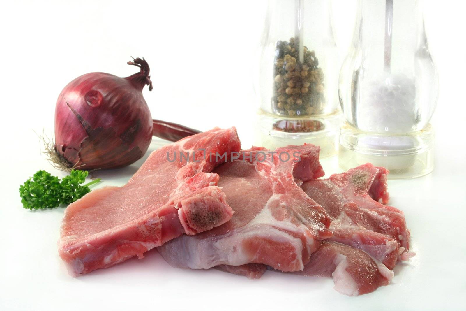 raw chops on a white background