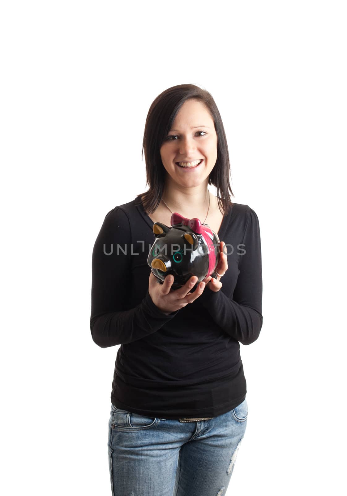 a young woman holding a piggy bank isolated on white