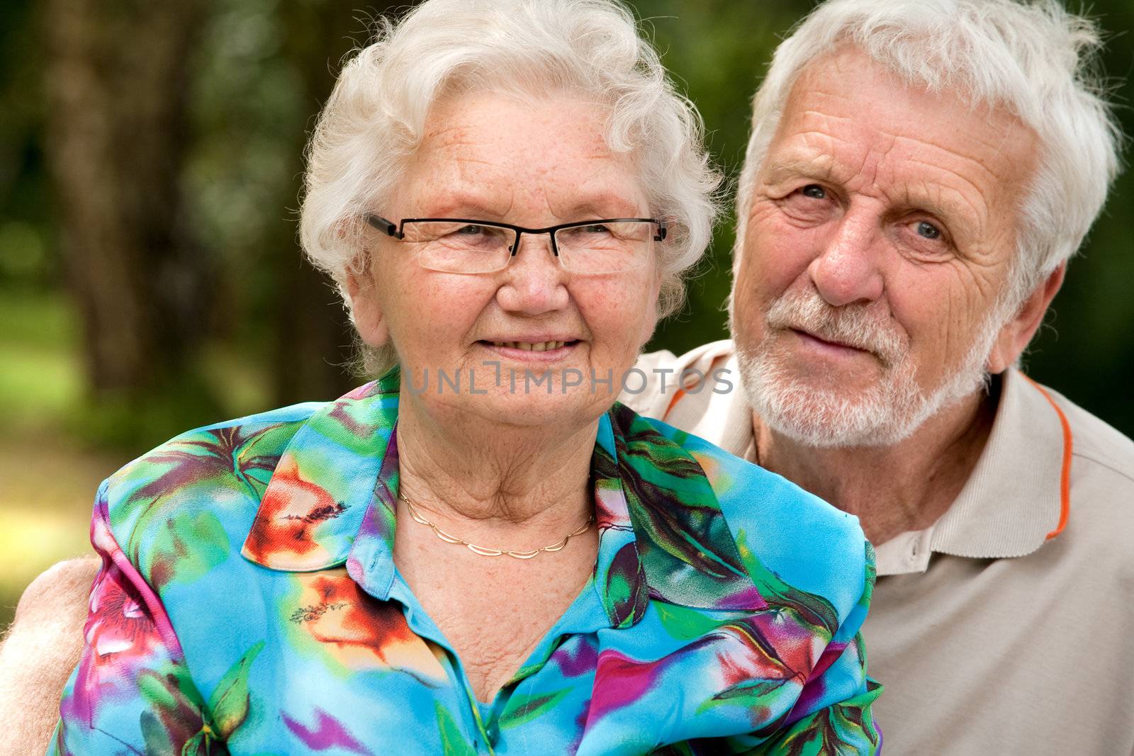 Happy Senior couple portrait by DNFStyle