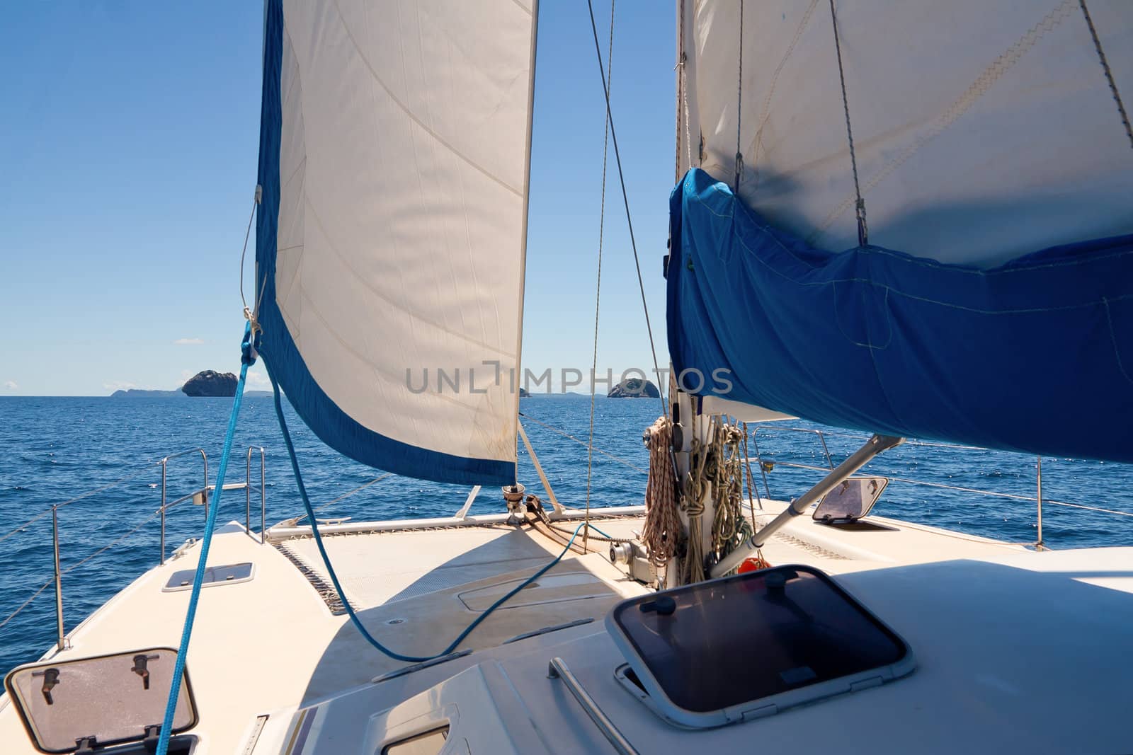 View of islands on the whiite luxury catamaran boat