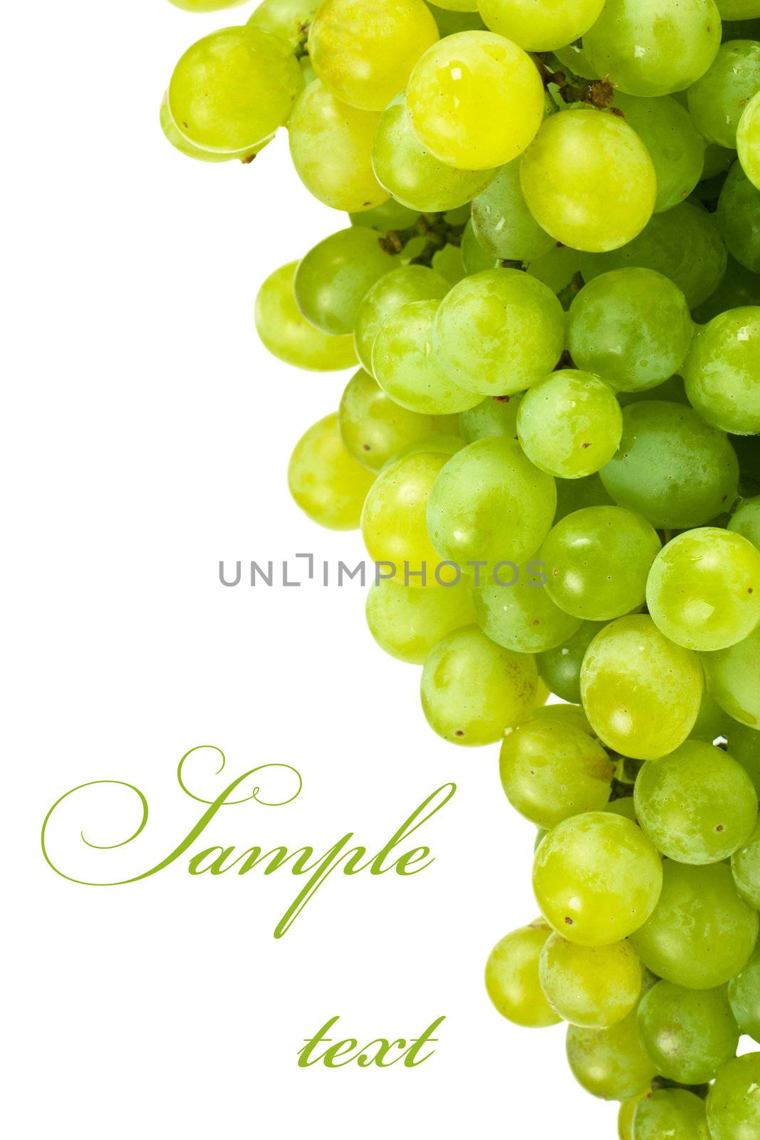 A bunch of green grapes over white background with copy space