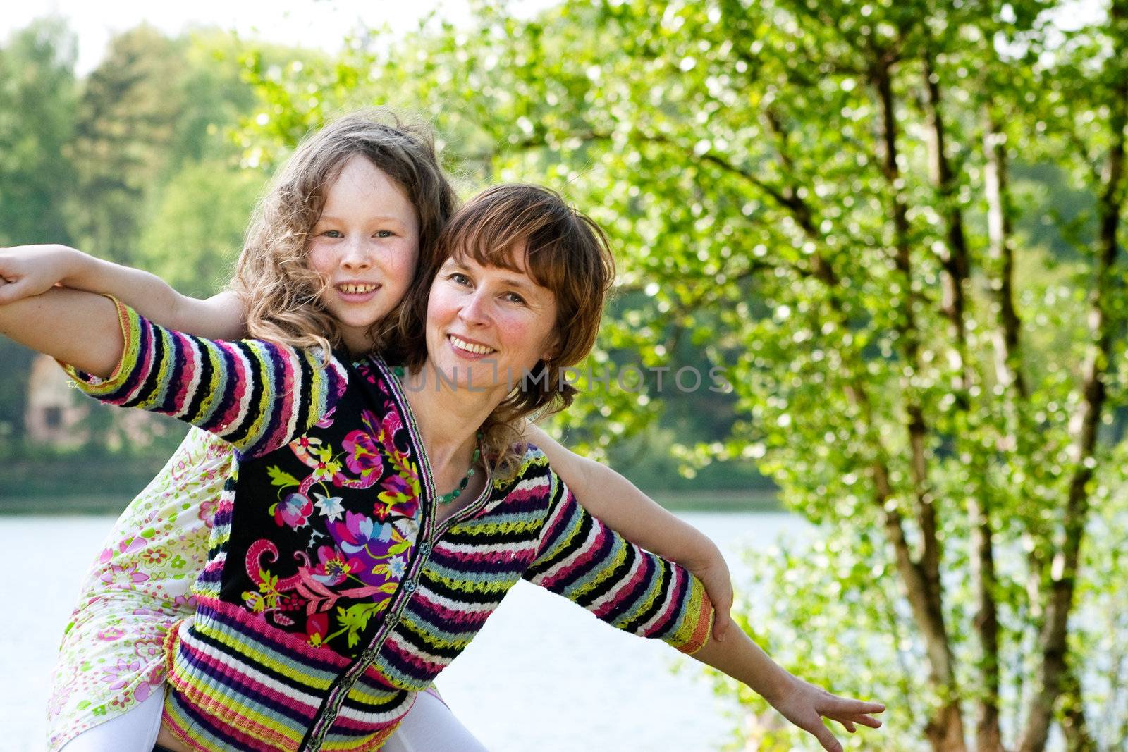 Mother and daughter have a happy time together