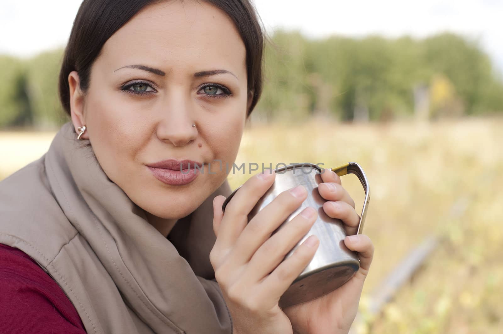 portrait of a beautiful girl, drinking from a cup by adam121