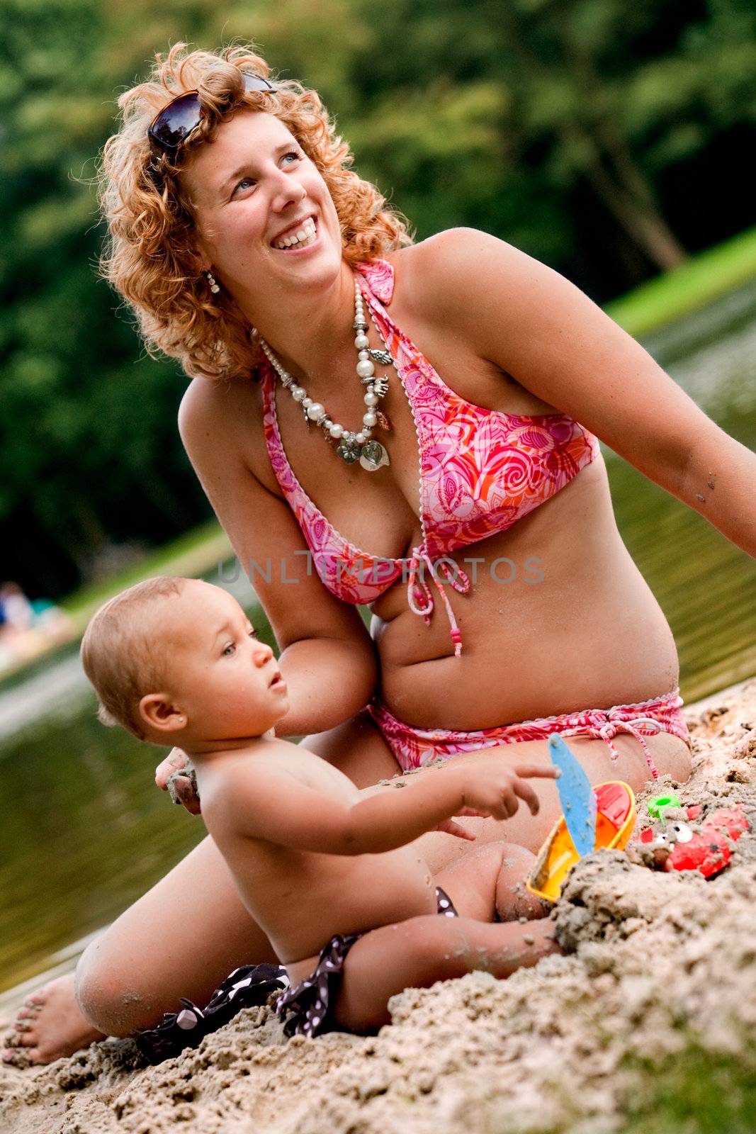 Playing in the sand with mother by DNFStyle